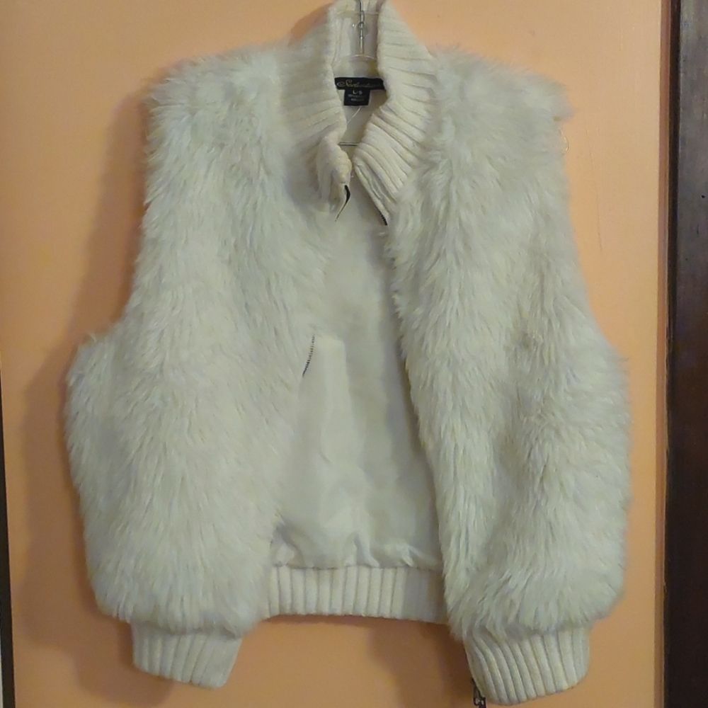 White faux fur vest